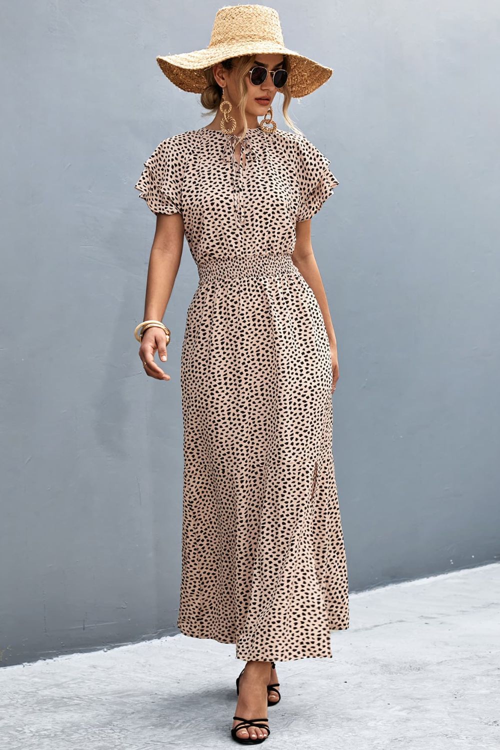 Robe imprimée fendue à col noué et manches flottantes