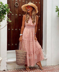 Robe mi-longue en mousseline de soie sans manches avec décolleté en V profond et coutures apparentes