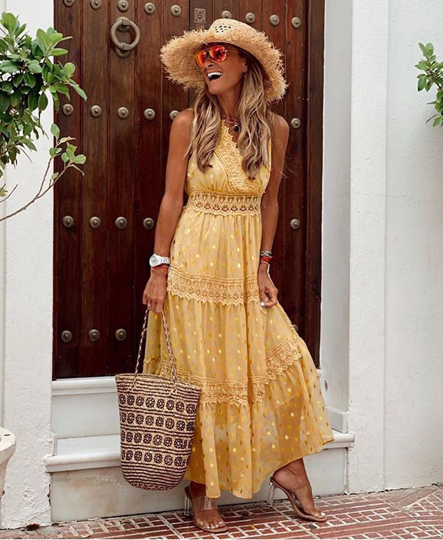 Robe mi-longue en mousseline de soie sans manches avec décolleté en V profond et coutures apparentes