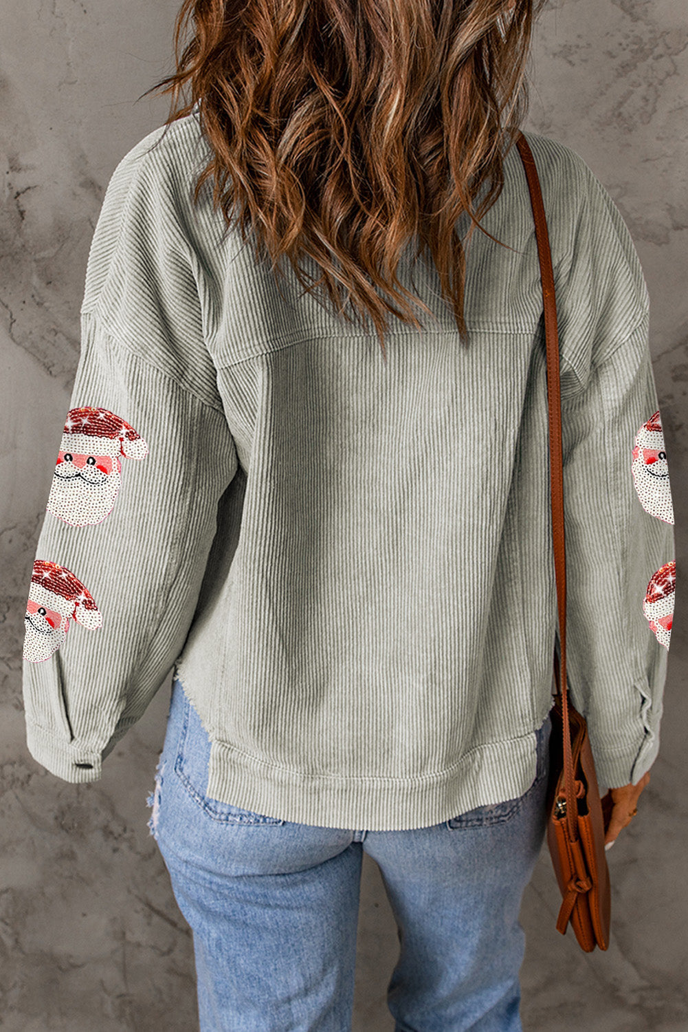 Graue Cordjacke mit Pailletten und Weihnachtsmann-Grafik und Klapptasche