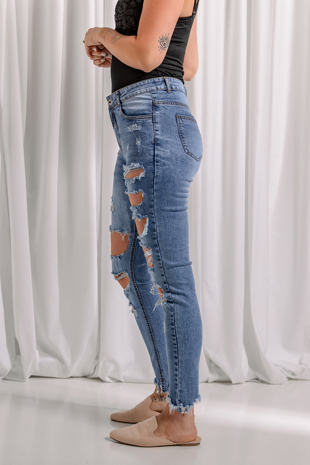 Jean skinny à ourlet brut effet usé
