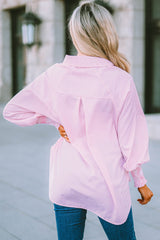 Chemise rayée à smocks et boutons sur le devant