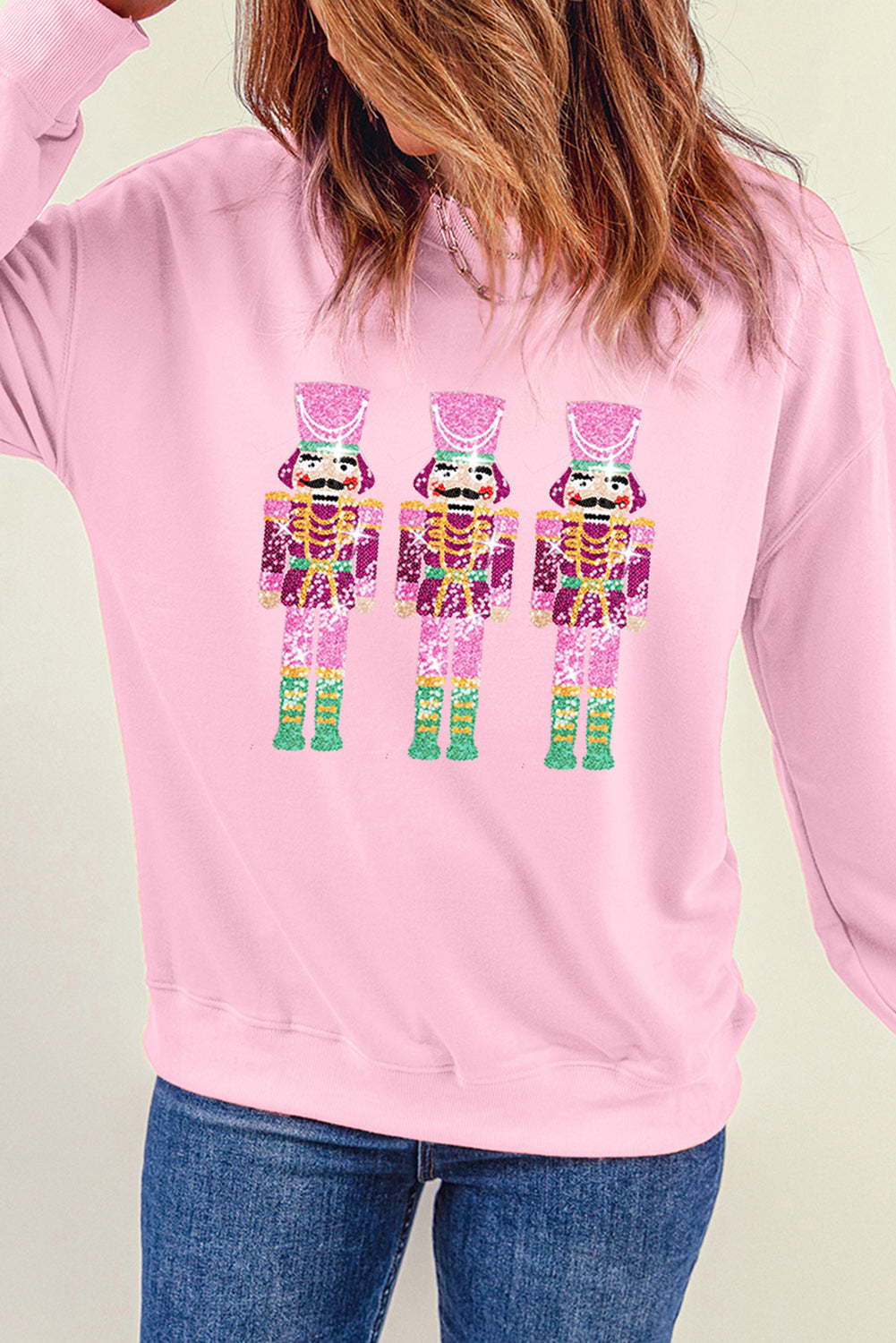 Sweat-shirt à col rond rose à motif Casse-Noisette de Noël