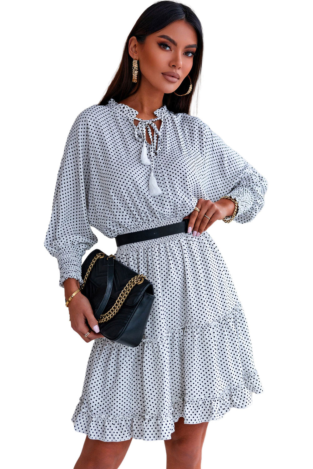 Robe à pois avec ourlet à volants et pompons