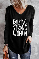 RAISING STRONG Graphic V-Neck Top