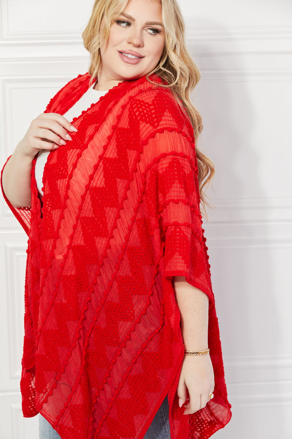 Justin Taylor – Asymmetrischer Poncho-Cardigan mit Pom-Poms in Rot