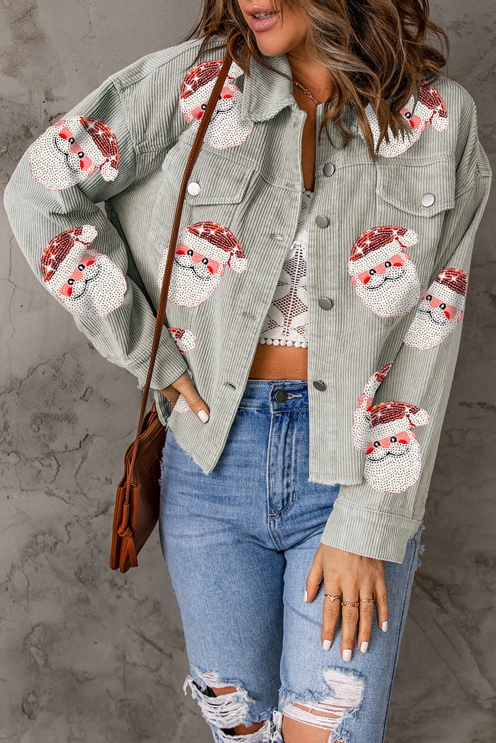 Graue Cordjacke mit Pailletten und Weihnachtsmann-Grafik und Klapptasche