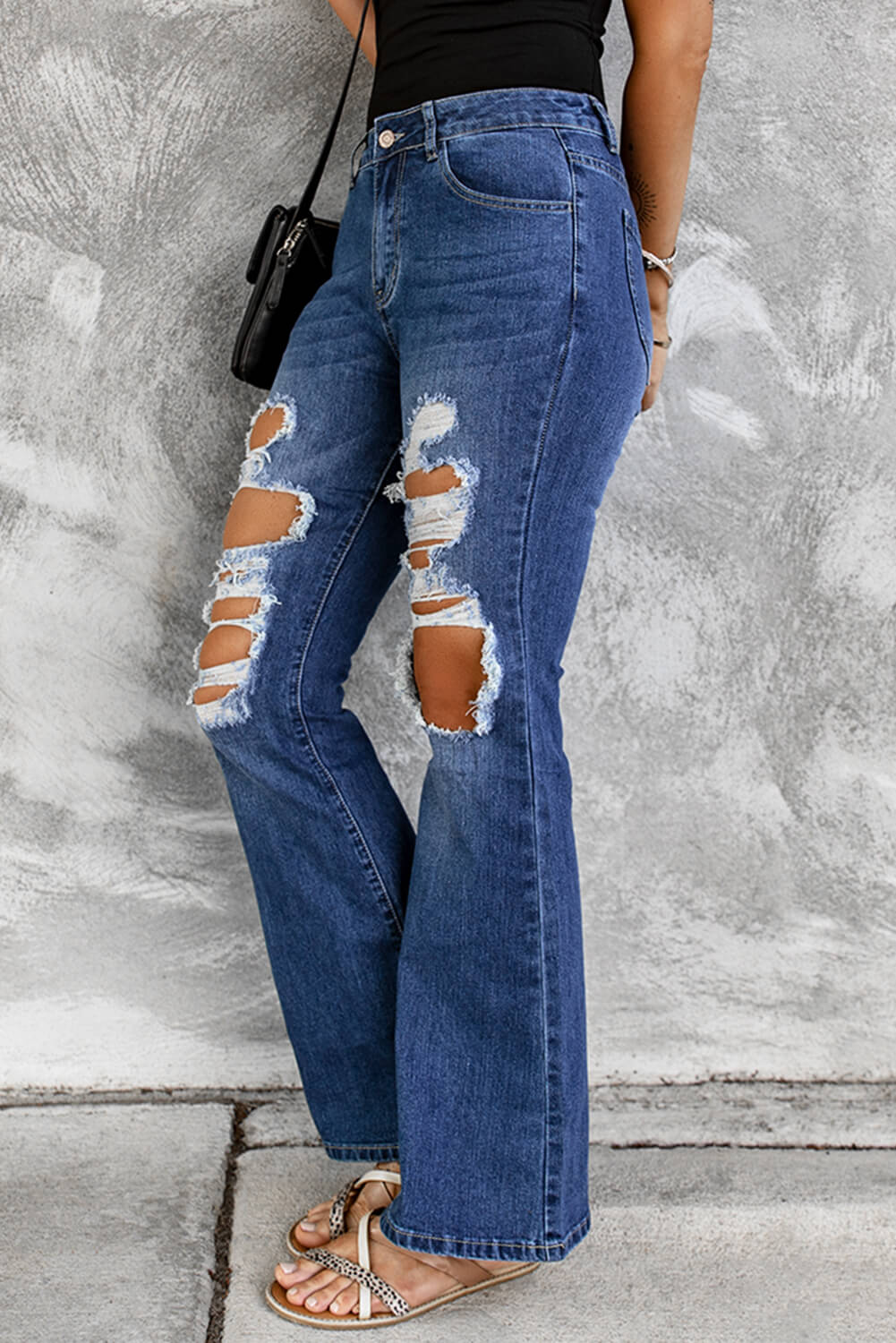 Jean évasé taille haute effet usé