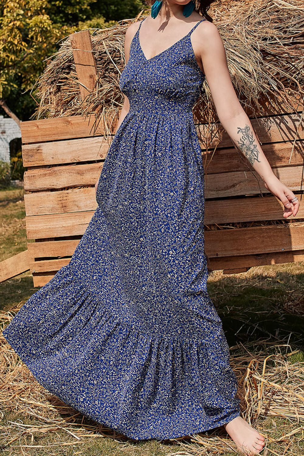Robe longue à fines bretelles et imprimé floral