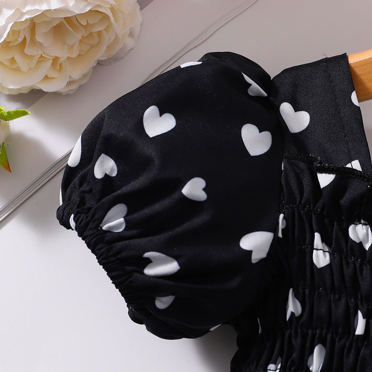 Robe smockée imprimée à col carré