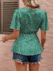 Chemisier à manches bouffantes et ceinture nouée à imprimé cœur