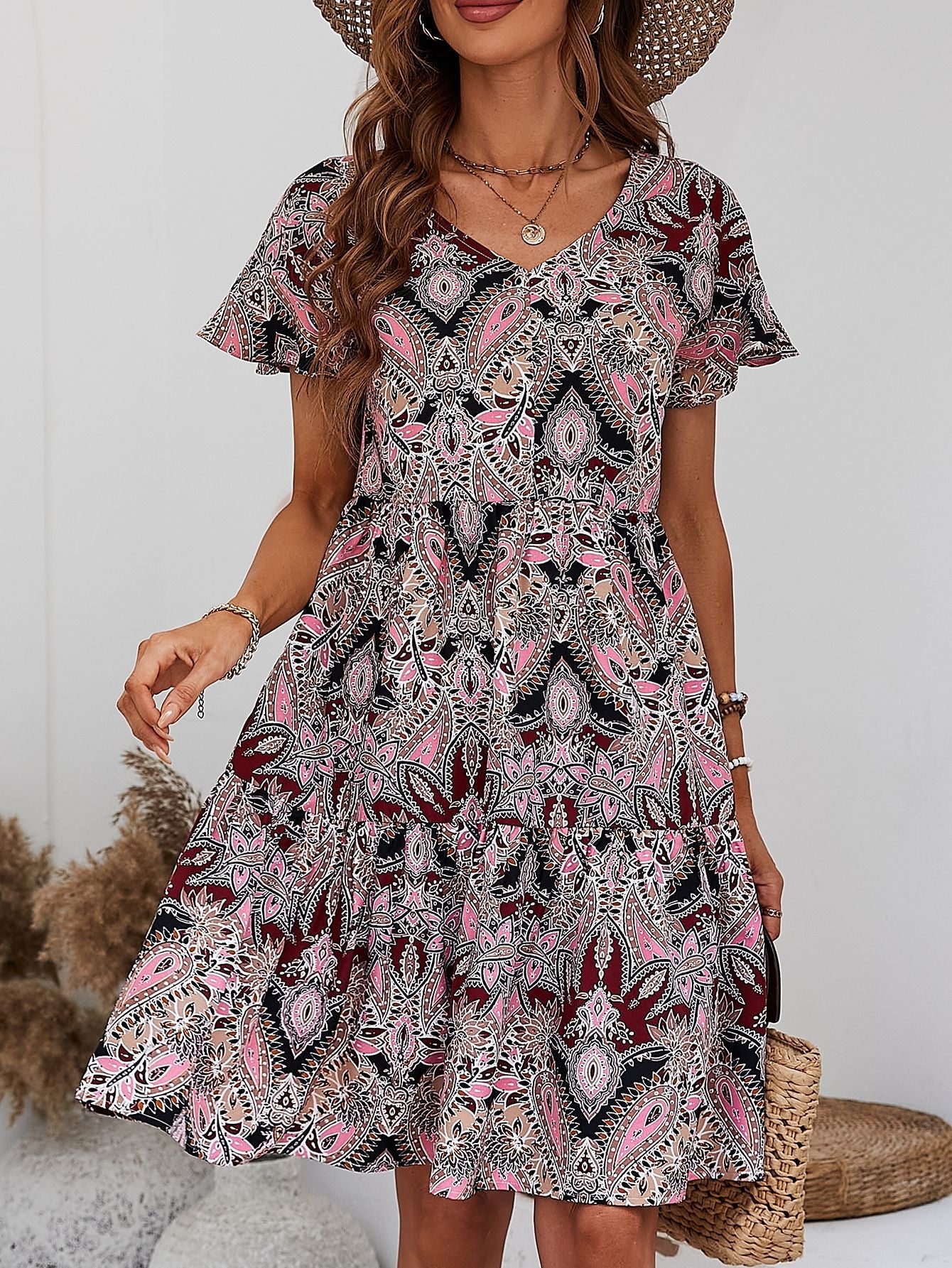 Robe imprimée à volants et col en V