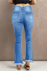 Jean taille haute à ourlet brut effet usé