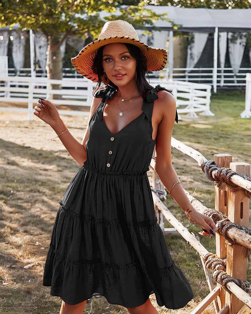 Robe à col en V et boutons décoratifs à épaules nouées