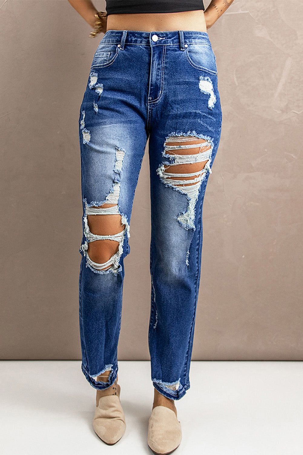 Jean taille haute usé avec poches
