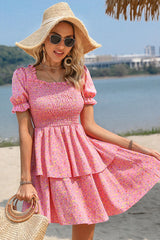 Robe smockée superposée à petites fleurs et à nouer dans le dos