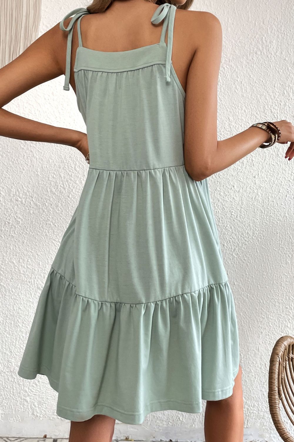 Robe à volants et épaules nouées avec poches