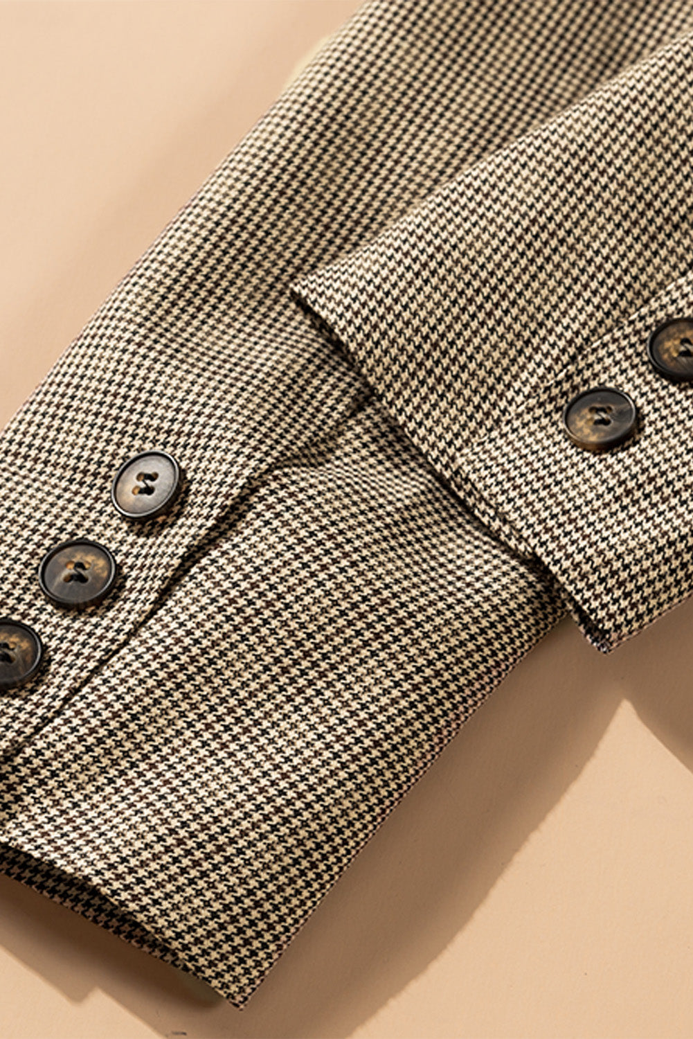 Blazer à carreaux avec col à revers et poignets boutonnés