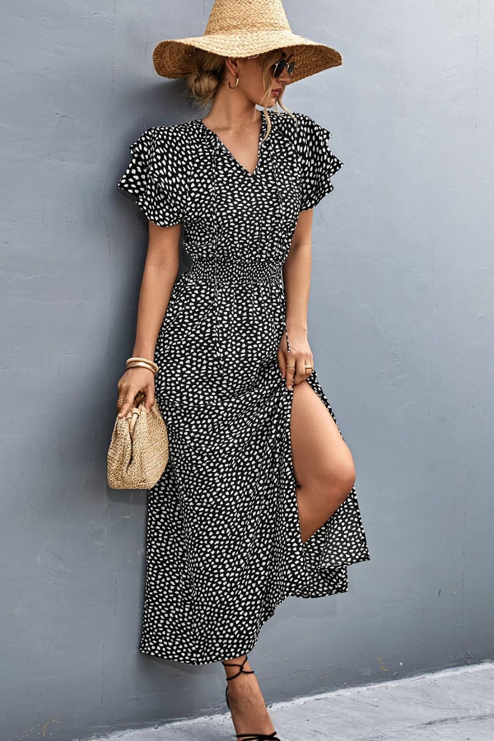 Robe imprimée fendue à col noué et manches flottantes