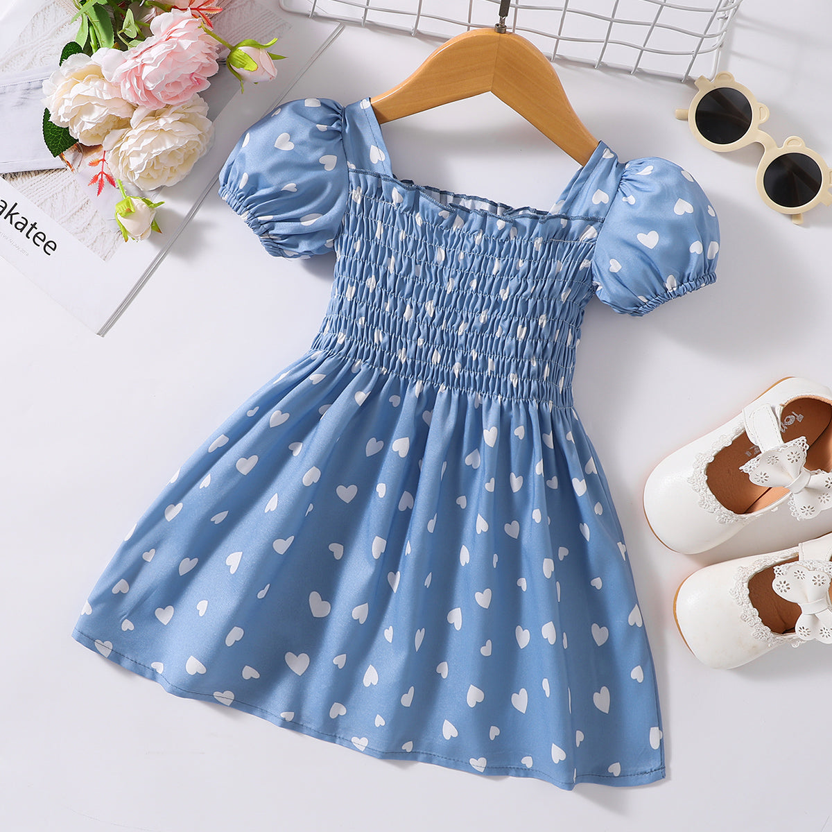 Robe smockée imprimée à col carré