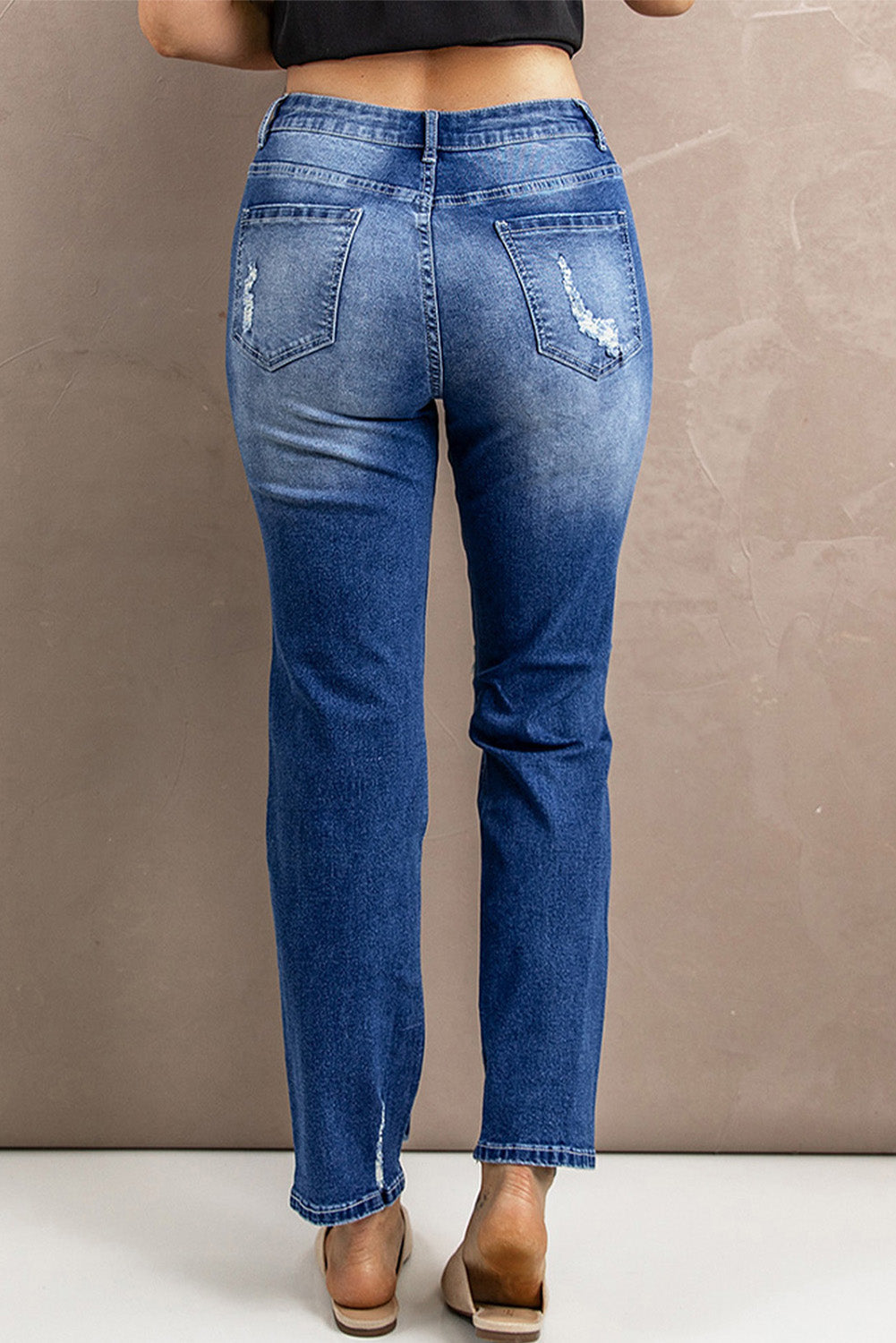 Jean taille haute usé avec poches