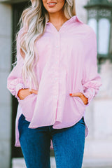 Chemise rayée à smocks et boutons sur le devant