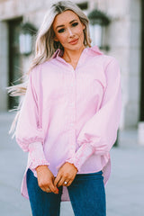 Chemise rayée à smocks et boutons sur le devant