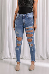 Jean skinny à ourlet brut effet usé