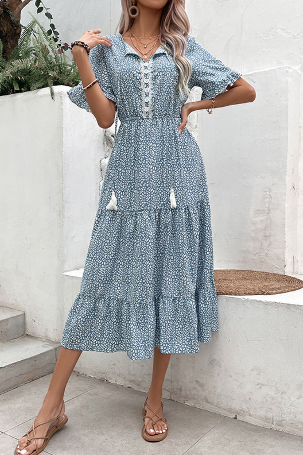 Robe imprimée à volants et pompons
