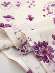 Robe courte sans manches à imprimé col en V et taille ajustée