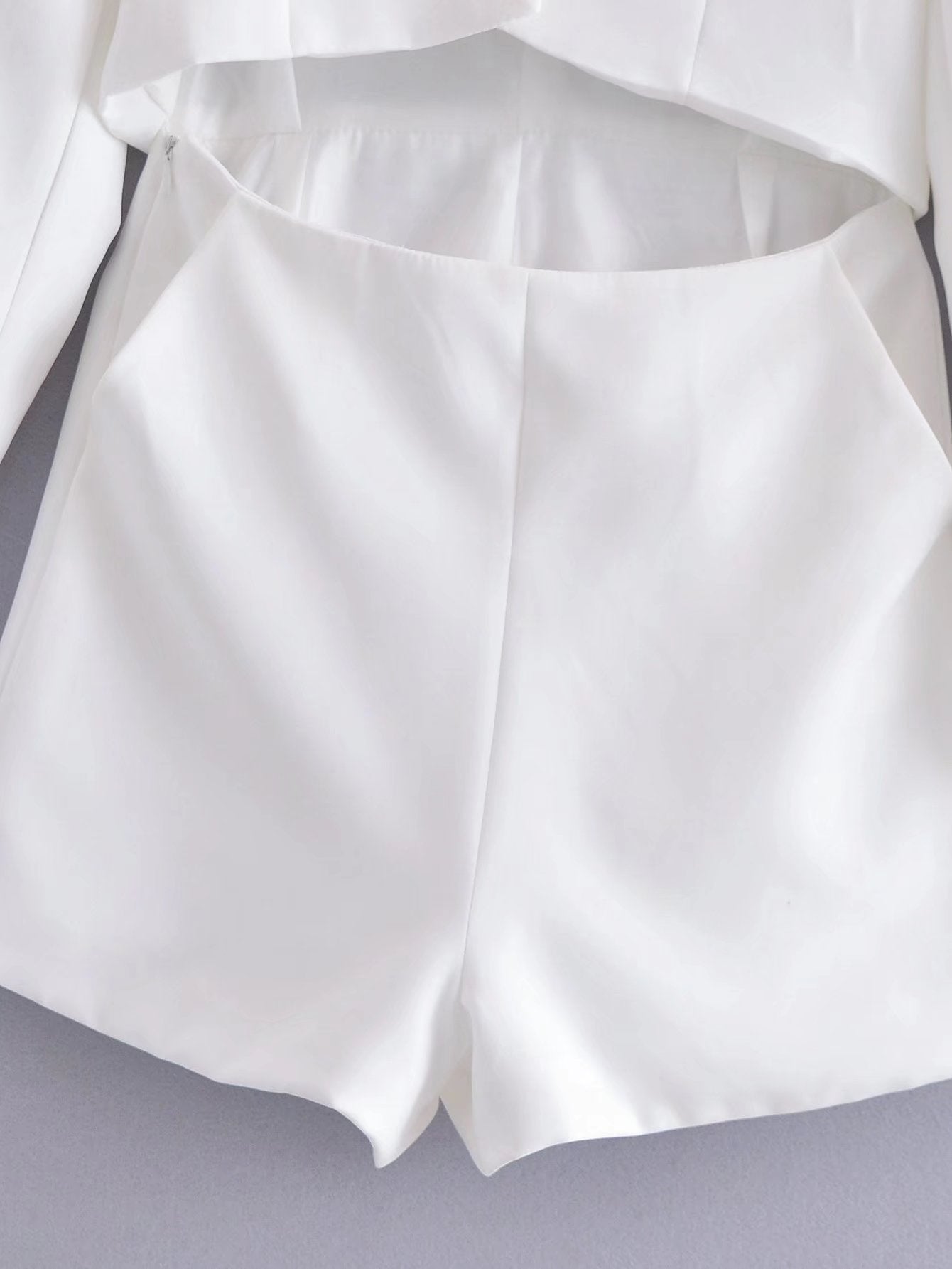 Polokragen, einfarbige Taille, ausgehöhlter Ausschnitt, offenes Ende, lässiger Strampler
