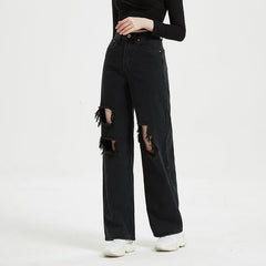 Jean taille haute déchiré et pantalon droit