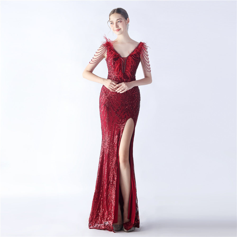 Robe de soirée longue à paillettes et plumes d'autruche de Heavy Industry