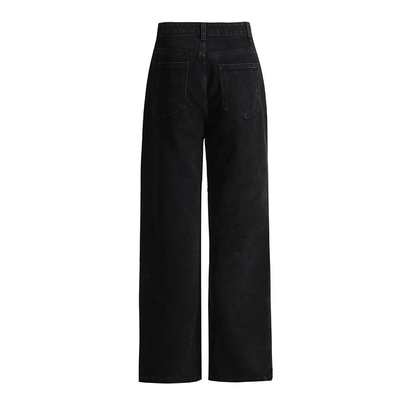 Pantalon en jean taille haute coupe droite, ample, troué, noir, drapé amincissant, jambe large, jean serpillière