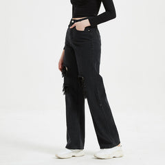 Jean taille haute déchiré et pantalon droit