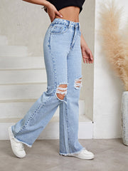 Pantalon en jean déchiré droit amincissant taille haute