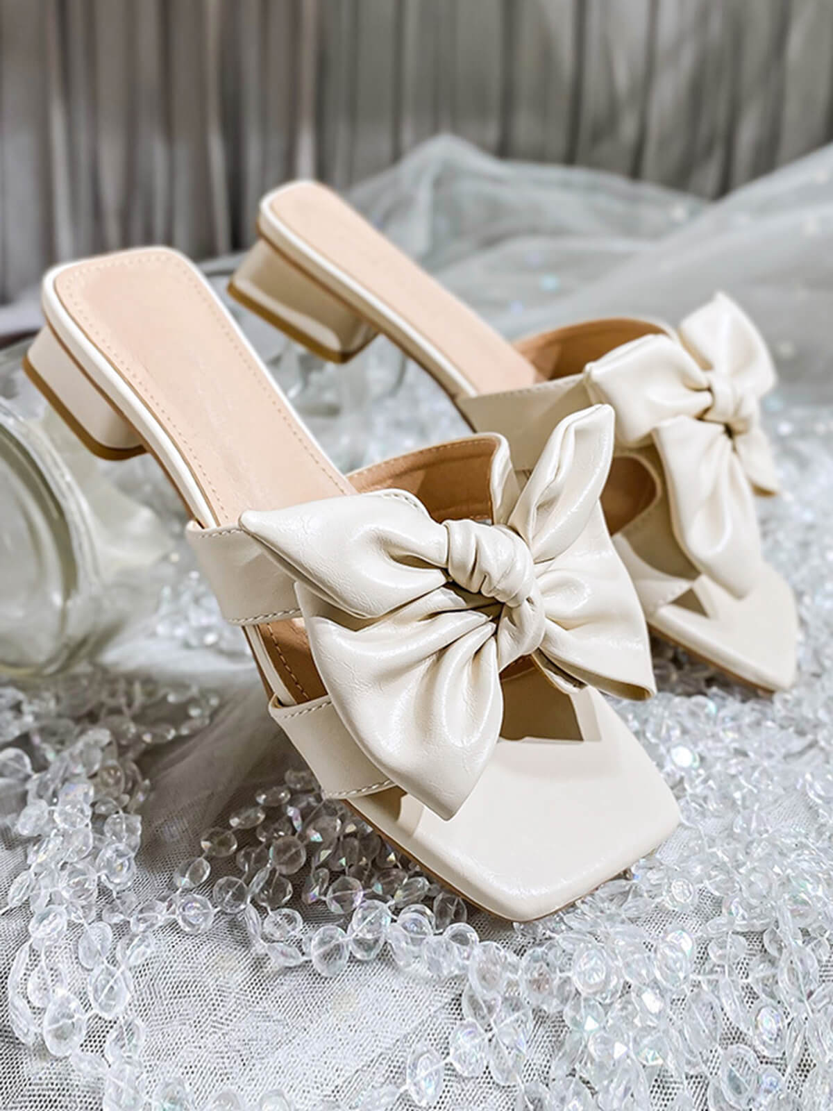 Chaussons compensés en cuir PU à talons bas et nœud papillon 