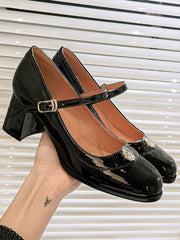 Chaussures à talons mi-hauts en cuir verni à bout rond