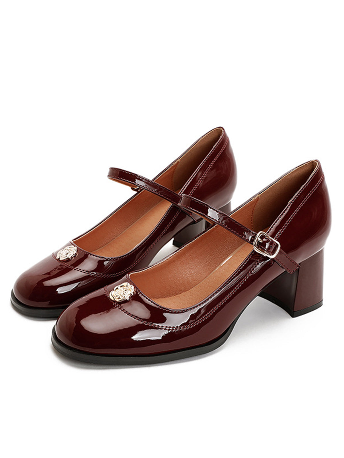 Chaussures à talons mi-hauts en cuir verni à bout rond