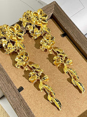 Boucles d'oreilles longues pétales vintage en or