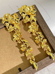 Boucles d'oreilles longues pétales vintage en or