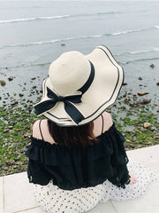 Vintage Strandhut mit gewelltem Rand und Schleife 
