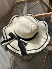 Vintage Strandhut mit gewelltem Rand und Schleife 