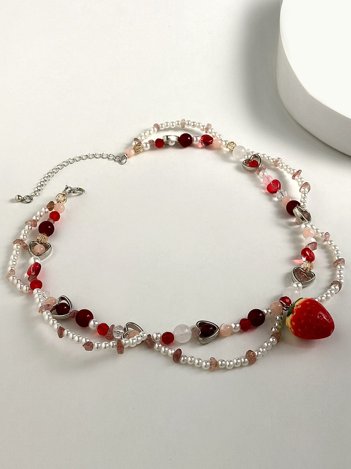 Collier de perles doubles fraise et cœur