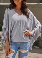 Haut à manches dolman et couture centrale à franges