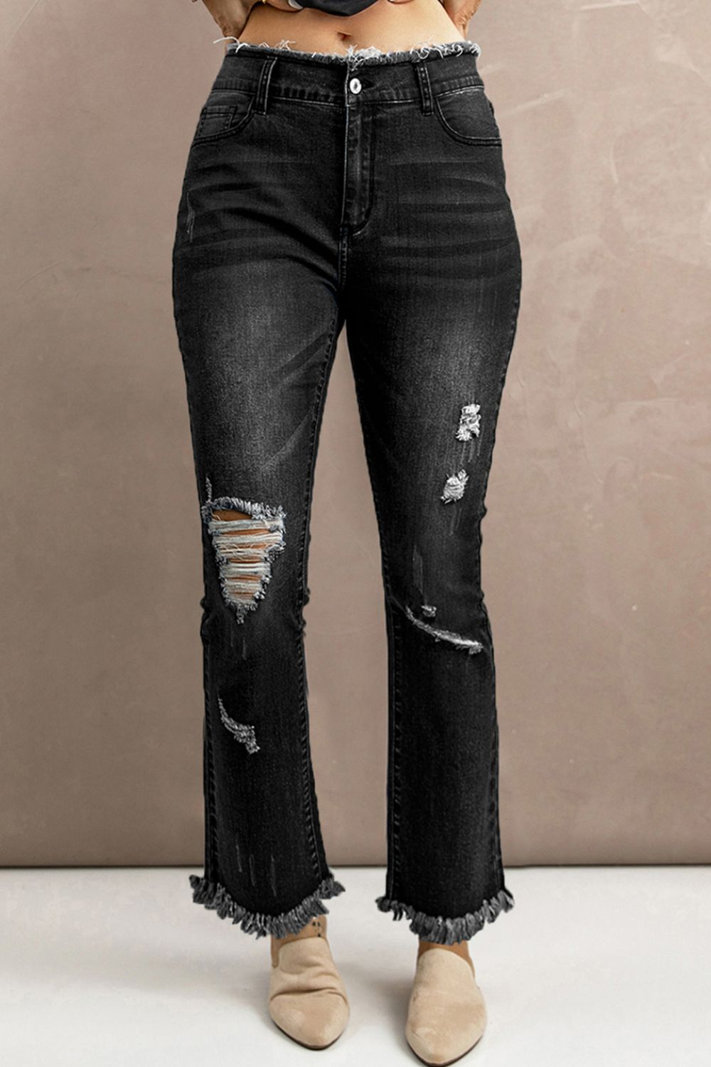 Jean taille haute à ourlet brut effet usé