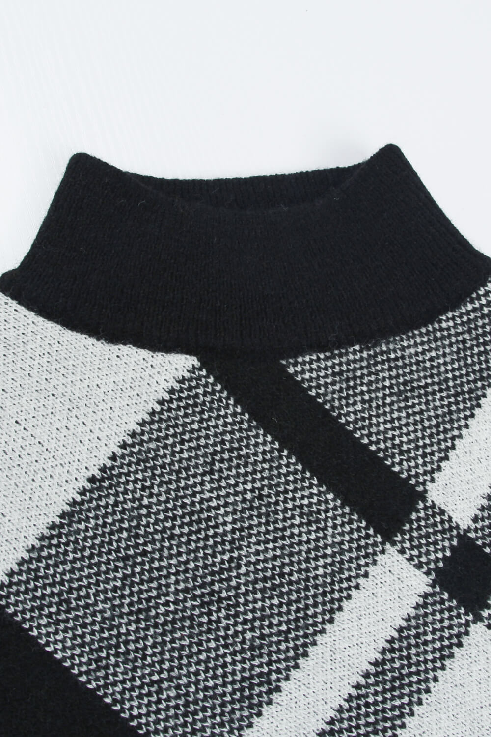 Poncho à carreaux, col montant et ourlet mouchoir