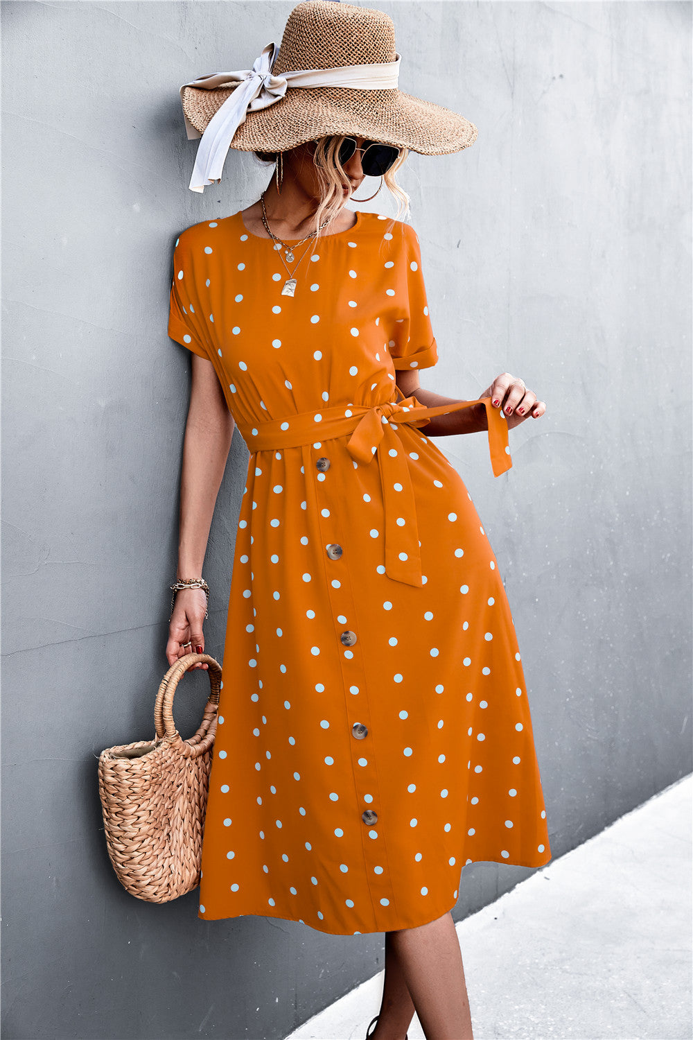 Robe à pois et col rond avec poches