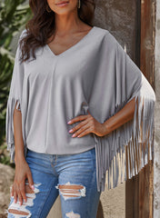 Haut à manches dolman et couture centrale à franges