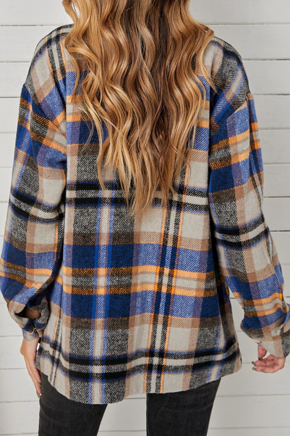 Veste boutonnée à poches à carreaux